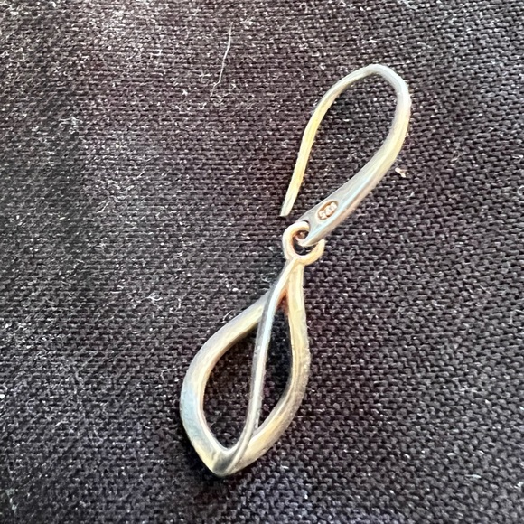 Silver earrings.  Only one.  Worn once and then I lost one. - Picture 2 of 3